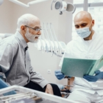 old man sitting dentist s office